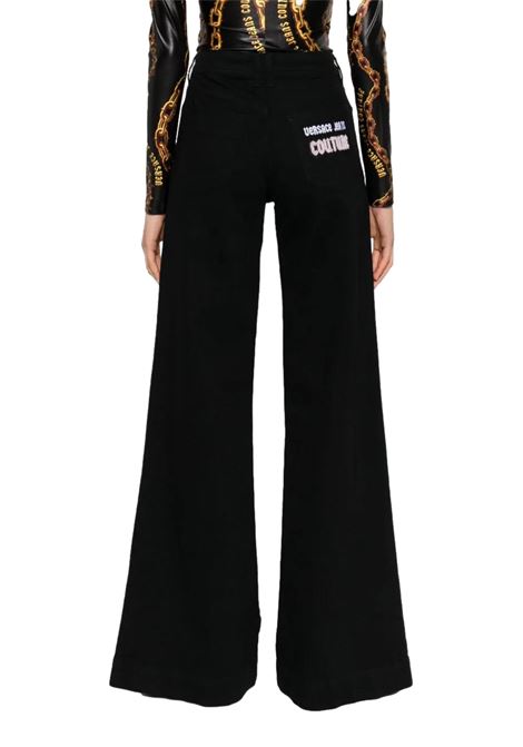 Flared jeans with decorations VERSACE JEANS COUTURE | Trousers | 77HAB506 CDW00909